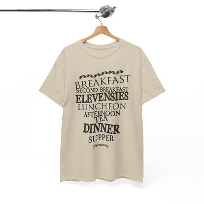 Chic beige t-shirt prominently hanging, embellished with the playful meal names beloved by hobbits, seamlessly merging casual wear with a tribute to Tolkien’s classic lore.