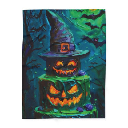 Decorative and Warm Halloween Spooky Arctic Fleece Blanket showcasing a hauntingly beautiful display of illuminated jack-o'-lanterns atop a whimsical cake, perfect for luxury Halloween décor.