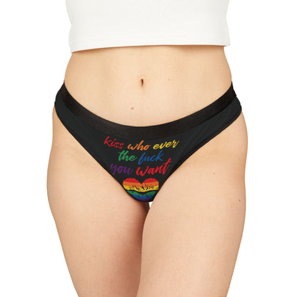 Luxury women's thong featuring a playful graphic design with the inscription 'Kiss who ever the fuck you want' and a vibrant rainbow heart, perfect for celebrating love and individuality.