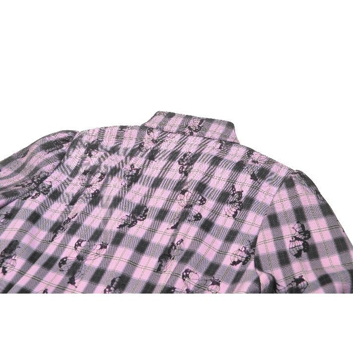 Close-up view of the exquisite fabric of the Dark In Love Ellery dress, highlighting the rich details of the pink butterfly pattern on high-quality material.