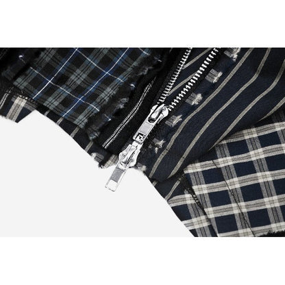 Close-up of the faux leather belt and eyelet details on the Dark In Love Sage Patchwork Mini Skirt, exemplifying edgy luxury in modern alternative clothing.