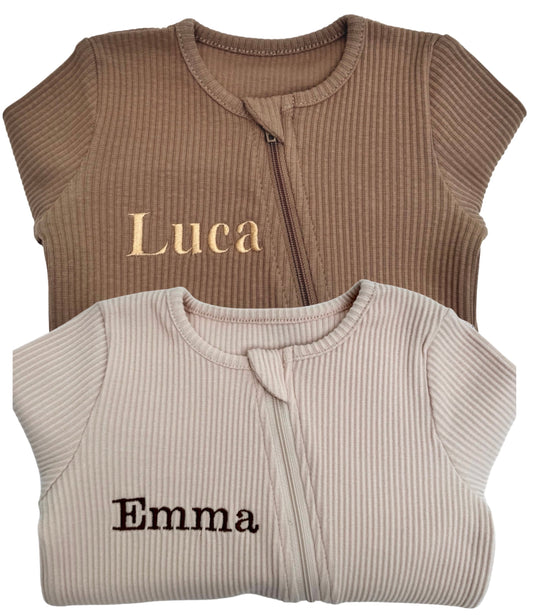 DreamBuy luxury zip sleepsuit for babies aged 0-36 months in soft ribbed cotton, designed for comfort and style, suitable for sensitive skin.
