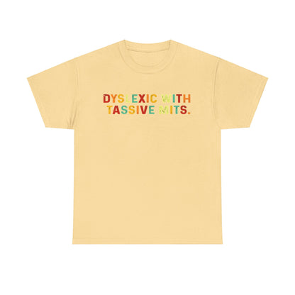 Luxury 'Dyslexic With Tassive Mits' cotton tee in soft yellow with vibrant rainbow text, perfect for comfortable everyday wear.