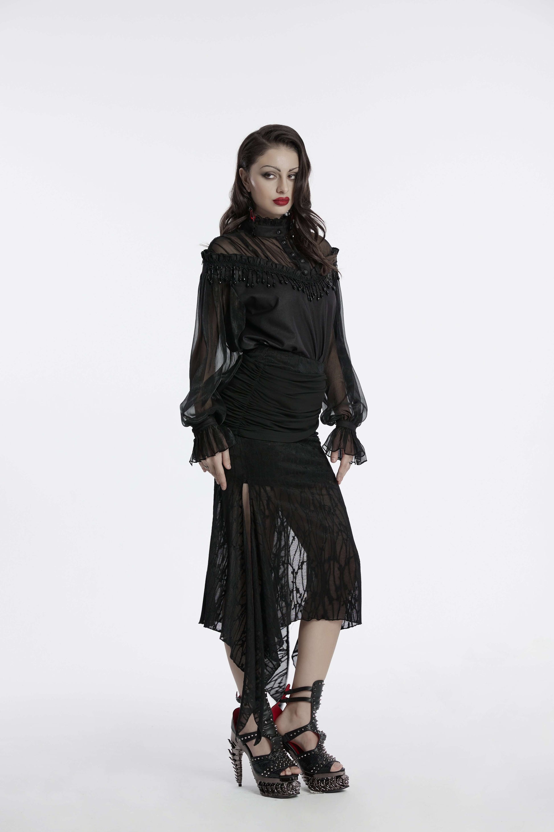 Elegant black Punk Rave Arti Fishtail Skirt showcasing its textured mesh and modal fabric, highlighted with a sophisticated slit hem for a luxurious punk rock aesthetic.