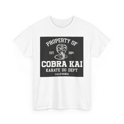Chic white t-shirt showcasing Cobra Kai branding, perfect for martial arts enthusiasts seeking style and comfort, detailed with retro typography.