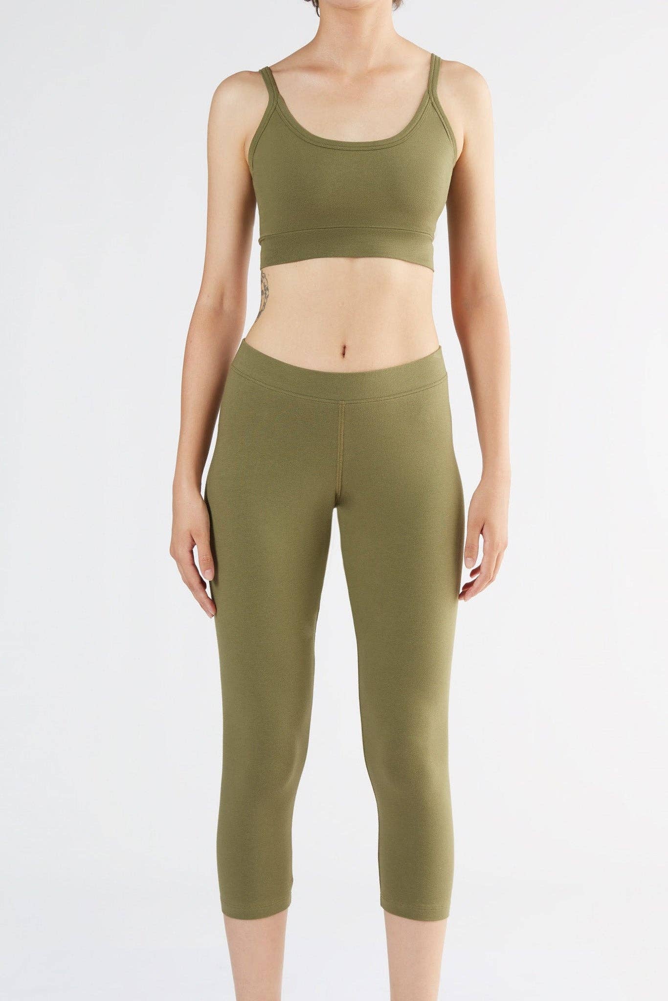 Luxury Organic Stretch 7/8 Leggings displayed in an elegant setting, emphasizing sustainability and refined style.