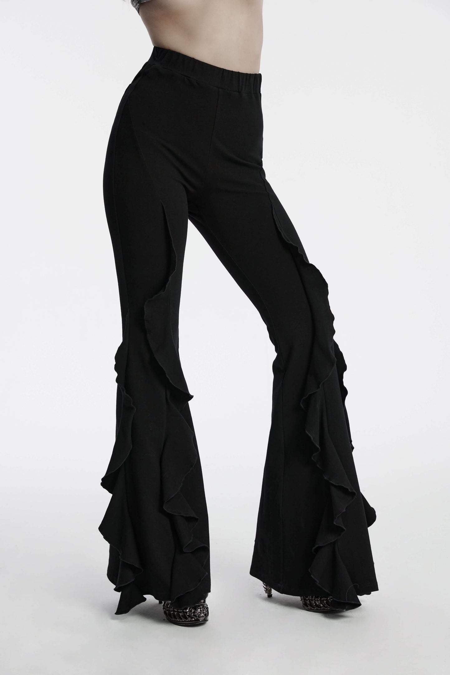 Elegant Punk Rave Veda Flared Pants showcasing ruffled fish tail hem, perfect for a chic yet edgy fashion statement. Ideal for stylish comfort in any occasion.