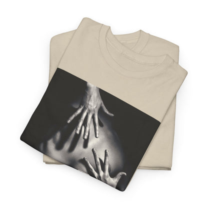 Stylish graphic t-shirt, laid flat, featuring a sophisticated black and white design of hands reaching towards a mystical nude form, ideal for avant-garde fashion enthusiasts.