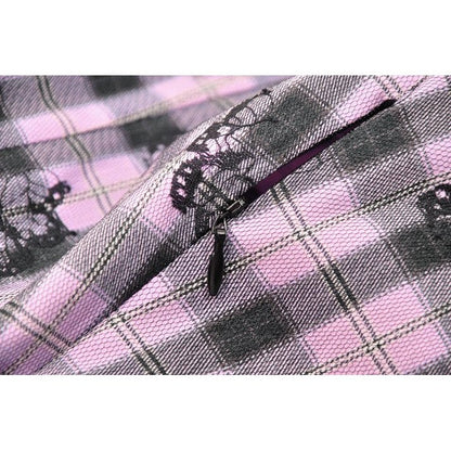 Full-length image of the Dark In Love Ellery dress, elegantly styled to accentuate the dramatic bell sleeves and captivating pink butterfly design.