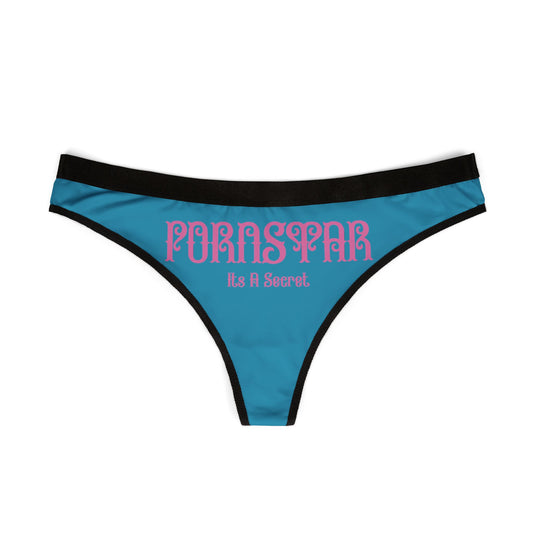 Elegant turquoise thong with stylish black trim, prominently displaying the daring 'PORNSTAR: It's a Secret' graphic, perfect for chic lingerie collections.