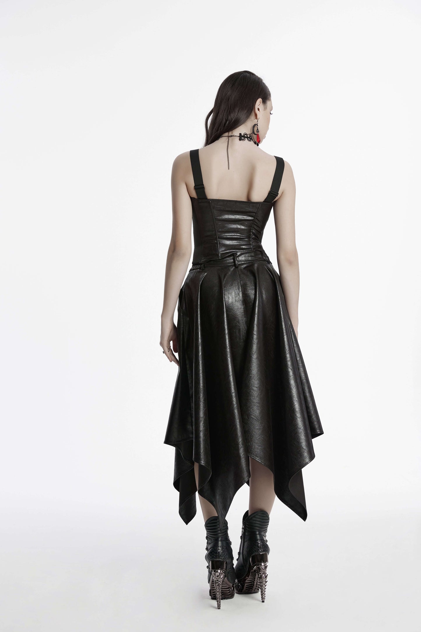 Side angle of Punk Rave Myra faux leather skirt highlighting the flattering fit and artistic irregular hem, ideal for modern fashion enthusiasts.