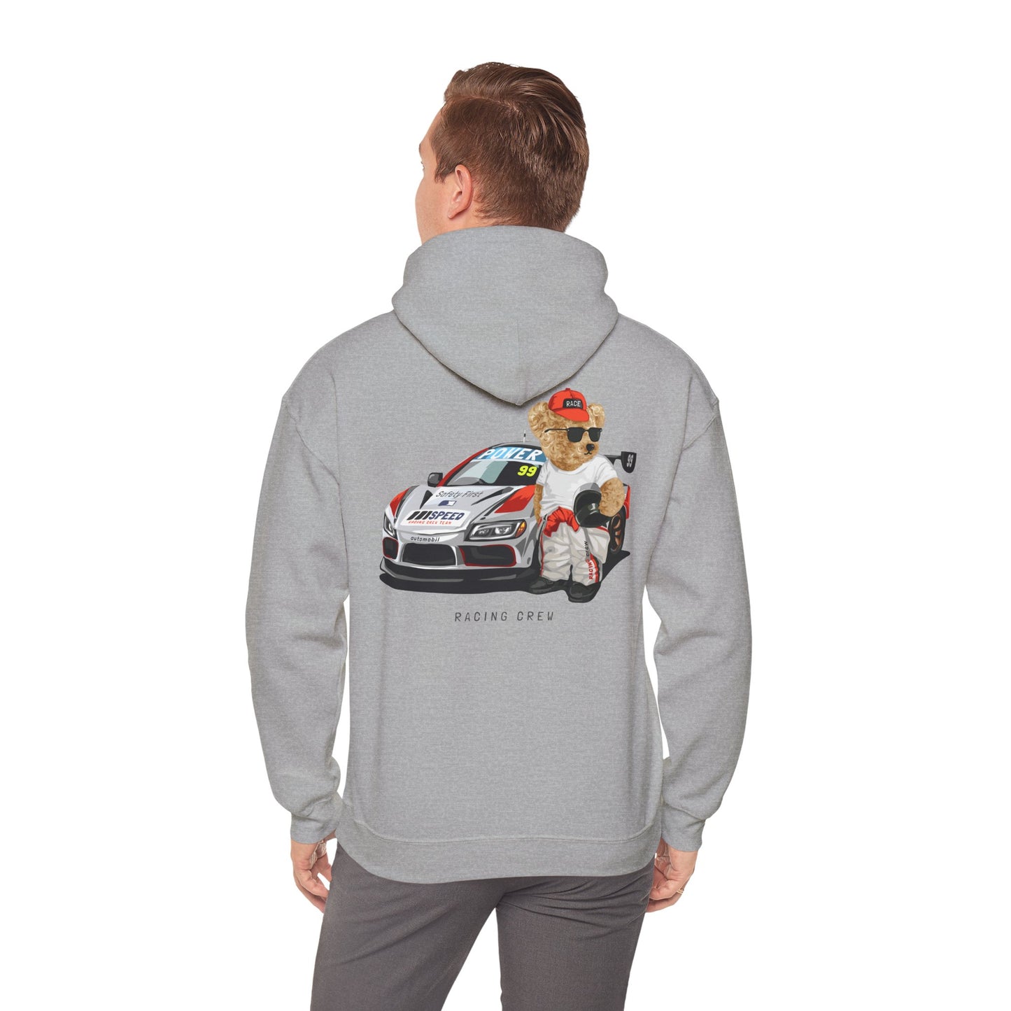Stylish model wearing a light grey hoodie featuring a charming teddy bear racer design on the back, embodying fun and adventure.