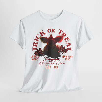 Elegant white unisex graphic t-shirt featuring a striking Demogorgon design for the Hellfire Club, with 'TRICK OR TREAT', 'UPSIDE DOWN', and 'Hawkins 1985' printed in bold vibrant colours, perfect for Halloween-themed events.