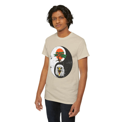 Elegant unisex graphic cotton t-shirt displaying a harmonious yin-yang design with a stylized bonsai tree and majestic eagle, ideal for adding a touch of comedy to martial arts attire.