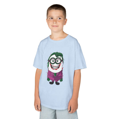 A happy child wearing a Minions Joker T-Shirt, featuring a fun design that blends the Minions character with the Joker from The Dark Knight Rises, perfect for kids who love both comics and animated films. This t-shirt captures a humorous and vibrant look, making it an ideal Funny Minions T Shirt.