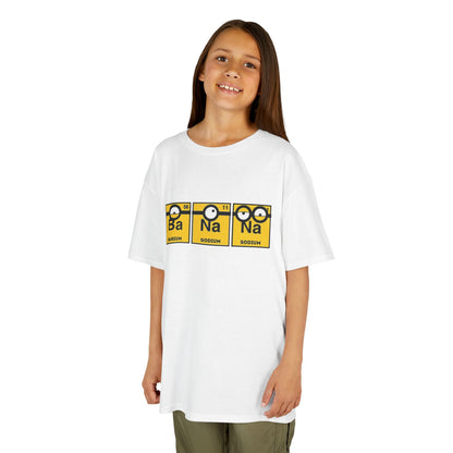 A child wearing the Minions Kids T-Shirt Banana Yellow Periodic Table Elements Tee showcasing the playful graphic of Barium and Sodium elements. Ideal for young science enthusiasts! T Shirt, Funny, Minions.