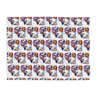 Decorative and Warm Halloween Cute Arctic Fleece Blanket laid flat, displaying an enchanting pattern of playful ghosts and pumpkins, ideal for cozy autumn nights.
