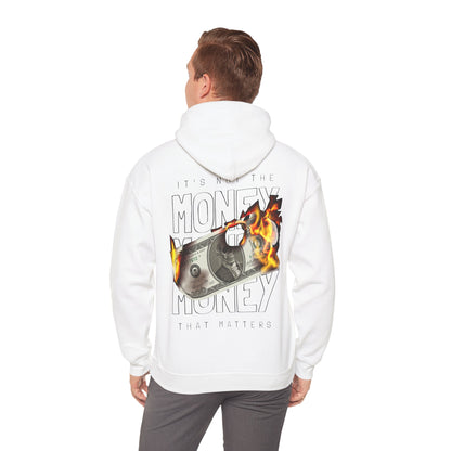 Stylish man wearing a white hoodie showcasing a bold back print: a fiery dollar graphic with the statement 'IT'S NOT THE MONEY.' An eye-catching blend of fashion and attitude.