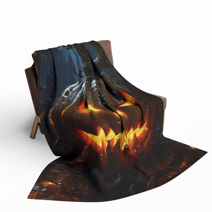 Stylish Decorative and Warm Halloween Spooky Arctic Fleece Blanket elegantly cascading over a chair with a striking jack-o'-lantern design, an exquisite addition to any luxurious Halloween celebration.