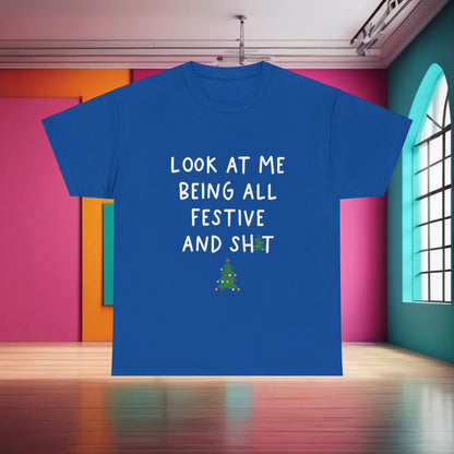 Chic Sarcasm Xmas Christmas Graphic T-Shirt illustrating the phrase 'LOOK AT ME BEING ALL FESTIVE AND SH*T', presented in an upscale indoor atmosphere.