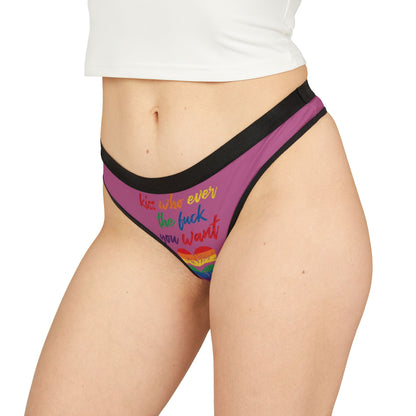 Luxury women's thong featuring a playful graphic that reads 'kiss whoever the fuck you want' adorned with vibrant rainbow colours and a heart design, perfect for cheeky romantic gifts, celebrations, or personal wardrobe flair.