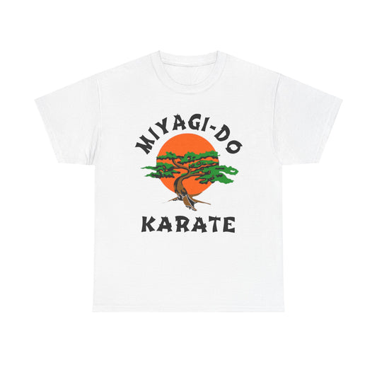 Luxury unisex Miyagi-Do Karate graphic t-shirt featuring a stylized bonsai tree design against a radiant orange sun backdrop, perfect for martial arts enthusiasts.