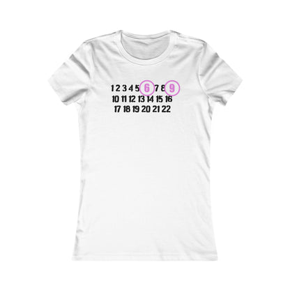 Luxury women's fitted T-shirt featuring a playful '69' design surrounded by numbers 1 to 22 in black and pink accents, perfect for adding a touch of cheeky charm to any outfit.