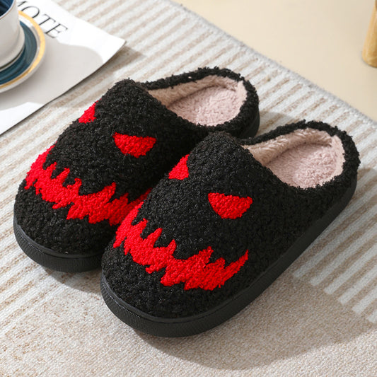 Luxurious Halloween Skull Cartoon Print Slippers in black with striking red detailing, perfect for men and women, ideal for stylish indoor relaxation.