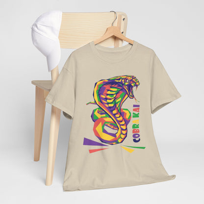 Stylish presentation of a Cobra Kai T-shirt showcased on a wooden chair alongside a white cap, highlighting a blend of casual chic and martial arts heritage.
