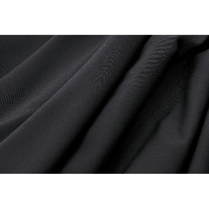 Model wearing the Dark in Love Keziah High Waisted Skirt styled with a petticoat, highlighting the voluminous bat wings hem for an elegant and playful look.