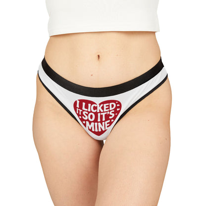 Elegant women's thong featuring the playful phrase 'I Licked It So It's Mine' on a stylish white background with a bold red heart design, perfect for adding a cheeky touch to Valentine's Day or special occasions.