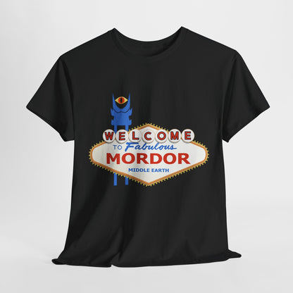 Showcasing the 'Welcome To Fabulous Mordor' unisex graphic T-shirt, this luxurious black tee features an eye-catching design with the phrase prominently displayed in vibrant colours, inspired by a whimsical take on Middle Earth and vintage signage.