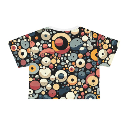 Emerson Belleau Blob Pattern Crop Top by Dazzling Dreams Studio displayed on a fashion hanger, highlighting its vibrant blob pattern and stylish design.