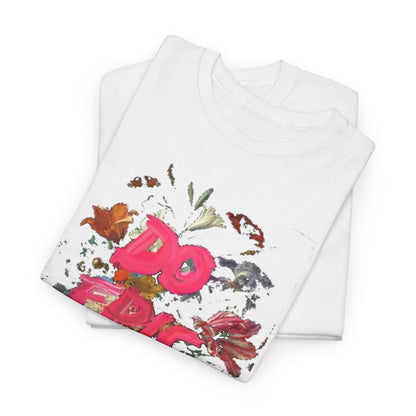 Elegant folded white t-shirts showcasing the striking 'DO EPIC SHIT' graphic surrounded by colourful floral elements, perfect for a chic casual look.