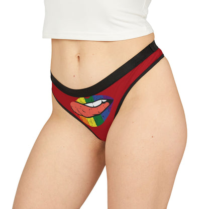 Chic women's thong modelled on a figure, artistically adorned with a playful graphic of vibrant rainbow lips, perfect for adding flair to intimate apparel collections.