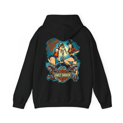 Chic black vintage garage hoodie showcasing an eye-catching back design of pin-up women and a motorcycle, surrounded by whimsical elements, perfect for the fashion-forward individual.
