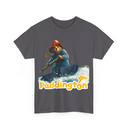 Front view of the refined Paddington Bear in Peru Graphic Unisex T-Shirt made of premium material, illustrating Paddington Bear adventurously seated on an umbrella-like vessel with vibrant imagery and the name 'Paddington' in stylish font.