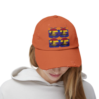 Unisex Distressed Paddleboarders Cap - Stylish sun protection while worn by a model, showcasing a vibrant orange cap with playful paddleboarding design.