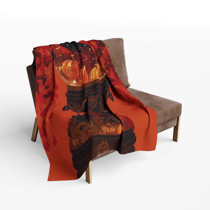 Decorative and Warm Halloween Spooky Arctic Fleece Blanket draped elegantly over a stylish armchair, featuring enchanting pumpkin motifs and autumn leaves; an ideal piece for luxurious seasonal comfort.