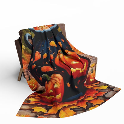 Stylishly draped Decorative and Warm Halloween Spooky Arctic Fleece Blanket cascading over a chair, adorned with playful pumpkins and leaves, enhancing the festive ambiance.