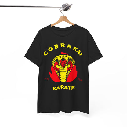 Stylish black T-shirt with the bold Cobra Kai logo displayed on a wooden hanger, epitomizing a blend of casual chic and martial arts heritage.