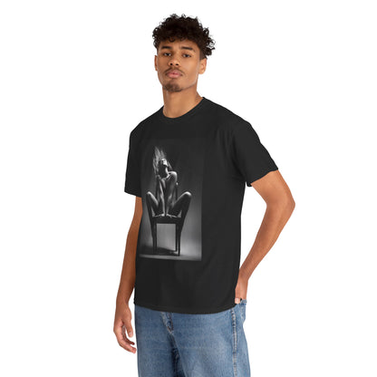 Stylish young man modelling a sophisticated black tee featuring an artistic grayscale design of a powerful woman, perfect for fashion-forward individuals.