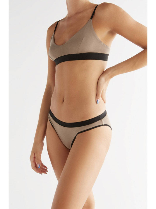 Eco-friendly women's bralette made from 94% micromodal and 6% elastane, showcasing a sleek and elegant design with moisture-regulating properties for active lifestyles.