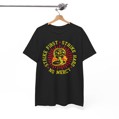 Sophisticated hanging display of the unisex Cobra Kai t-shirt featuring the striking 'Strike First, Strike Hard, No Mercy' design against a minimalist background.