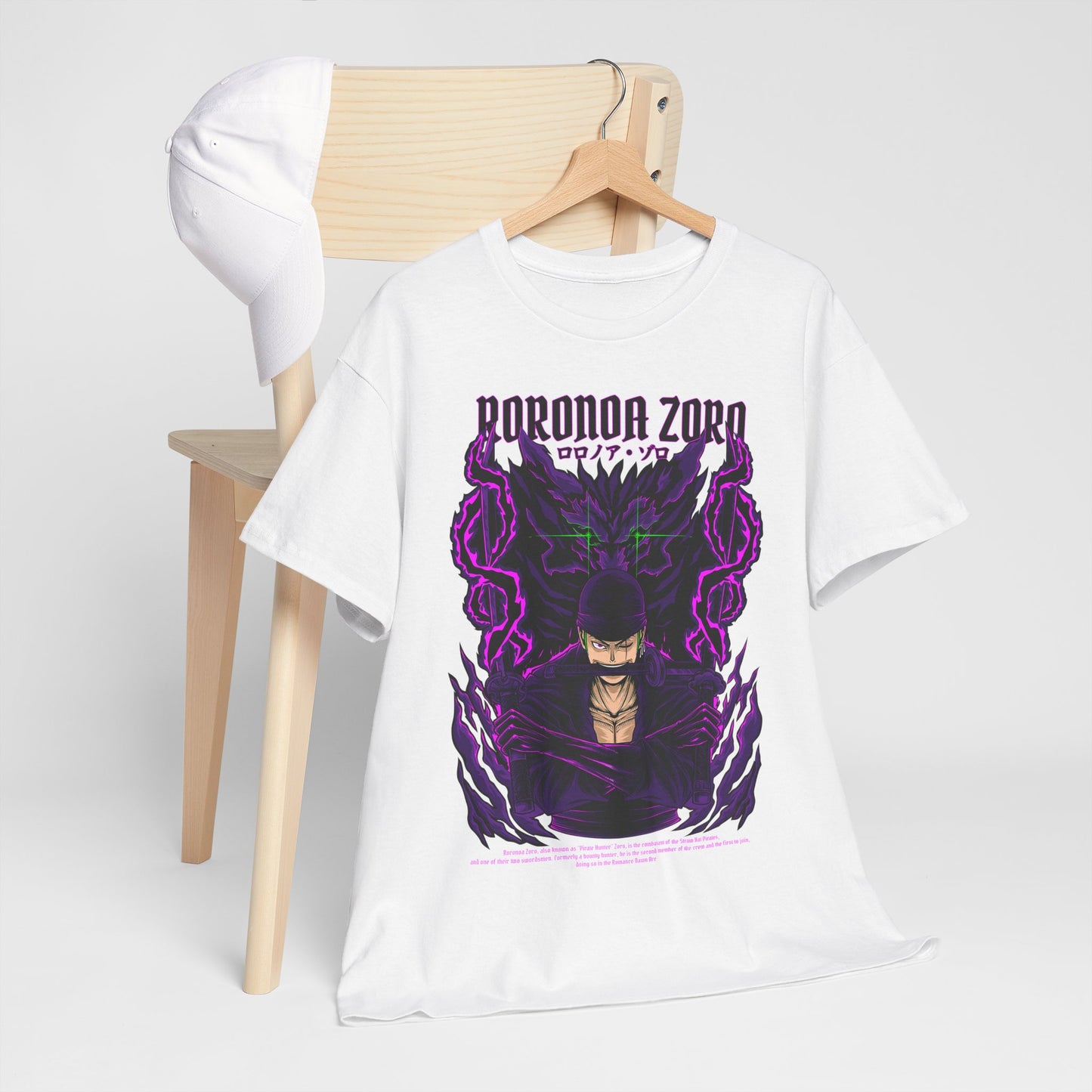 Chic setup featuring Roronoa Zoro graphic tee draped over a chair, complemented by a cap, showcasing captivating design elements in a luxurious, casual fashion.