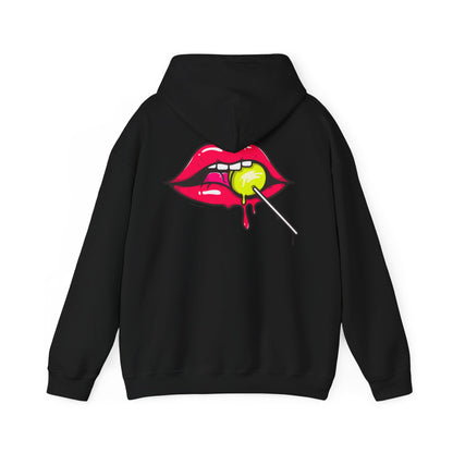 Stylish black hoodie featuring a vibrant graphic of glossy red lips with a green lollipop, a chic statement piece for trendsetters.