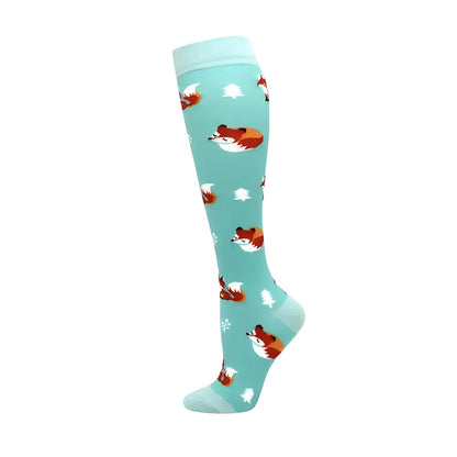Beautiful Women's Knee Length Compression Travel Socks featuring delightful fox illustrations against a soft turquoise background, adding a whimsical touch to travel attire.