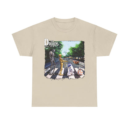 Luxurious graphic t-shirt featuring 'The Droids' from Star Wars, inspired by the Abbey Road album cover, showcasing an artistic rendition of beloved droids crossing a whimsical pedestrian crosswalk.