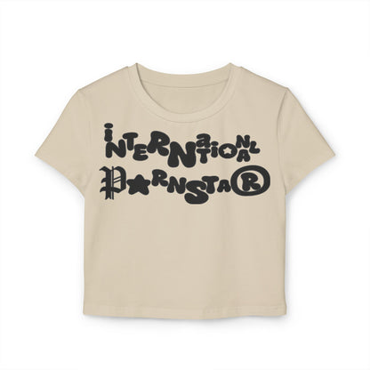 Front view of an elegant cream cropped t-shirt with bold graphic lettering, combining comfort and style effortlessly.