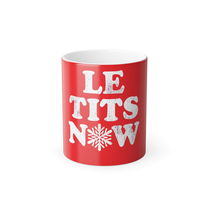 Let It Snow Le Tits Now Christmas Color Morphing Mug, elegantly displayed with a festive red exterior and whimsical lettering, perfect for adding a touch of humour to holiday celebrations.